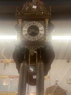 Antiek wandklok, Ophalen