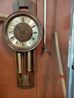 antieke hangklok, Ophalen