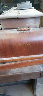 antieke intacte slinger naaimachine, Ophalen