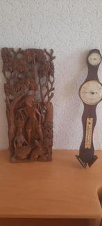 Hout snijwerk en thermometer, Ophalen