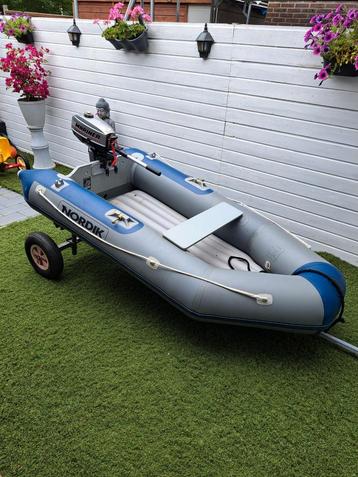 rubberboot 250 met een 3,3 pk marinier motor + strandtrailer beschikbaar voor biedingen