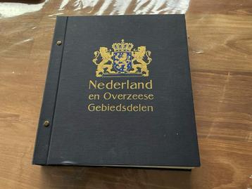 Album: Nederland en Overzeese gebieden. Met  postzegels