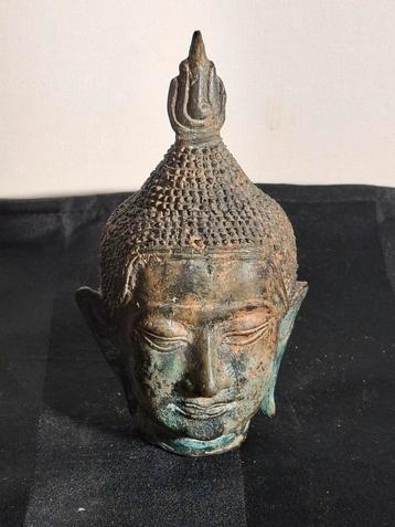 Antiek bronzen Boeddha Hoofd met patina. beschikbaar voor biedingen