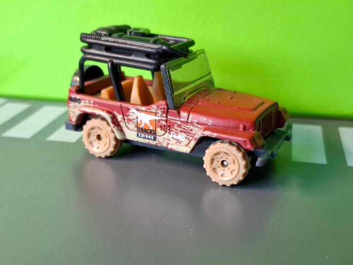 Matchbox - 1998 Jeep Wrangler Dino Mountain [rood] 1/60, Hobby en Vrije tijd, Modelauto's | Overige schalen, Gebruikt, Auto, Ophalen of Verzenden