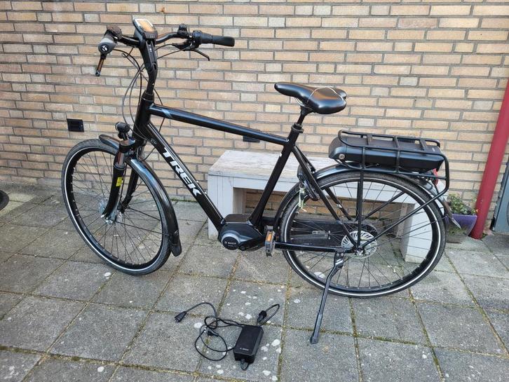 Degelijke elektrische Trek herenfiets groot model Bosch, Fietsen en Brommers, Elektrische fietsen, Gebruikt, Overige merken, 59 cm of meer