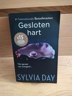 Boek. Chicklit. Roman. Sylvia day - gesloten hart., Ophalen of Verzenden, Gelezen