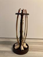 Goudse pijpen in een houten standaard, Ophalen