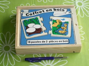 10 puzzeltjes in houten doosje - Coffret en bois beschikbaar voor biedingen