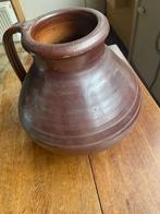 Grote antieke aardewerk vaas, Ophalen