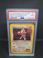 Rocket's Hitmonchan Holo 1st Edition Gym Heroes PSA 9, Hobby en Vrije tijd, Verzamelkaartspellen | Pokémon, Ophalen of Verzenden