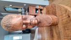 tropisch hardhouten beeld, Ophalen