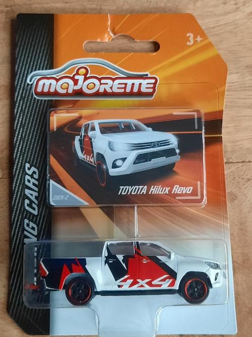 Majorette Toyota Hilux Revo in licht beschadigde verpakking, Hobby en Vrije tijd, Modelauto's | Overige schalen, Zo goed als nieuw