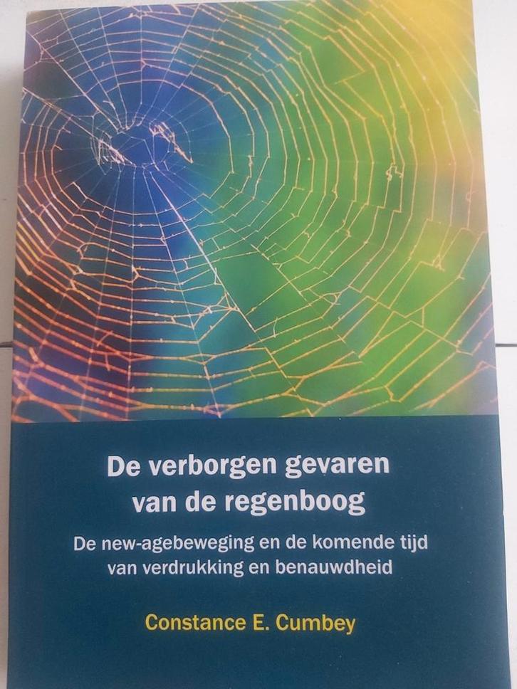 Constance Cumbey - De verborgen gevaren van de regenboog, Boeken, Godsdienst en Theologie, Zo goed als nieuw, Ophalen of Verzenden