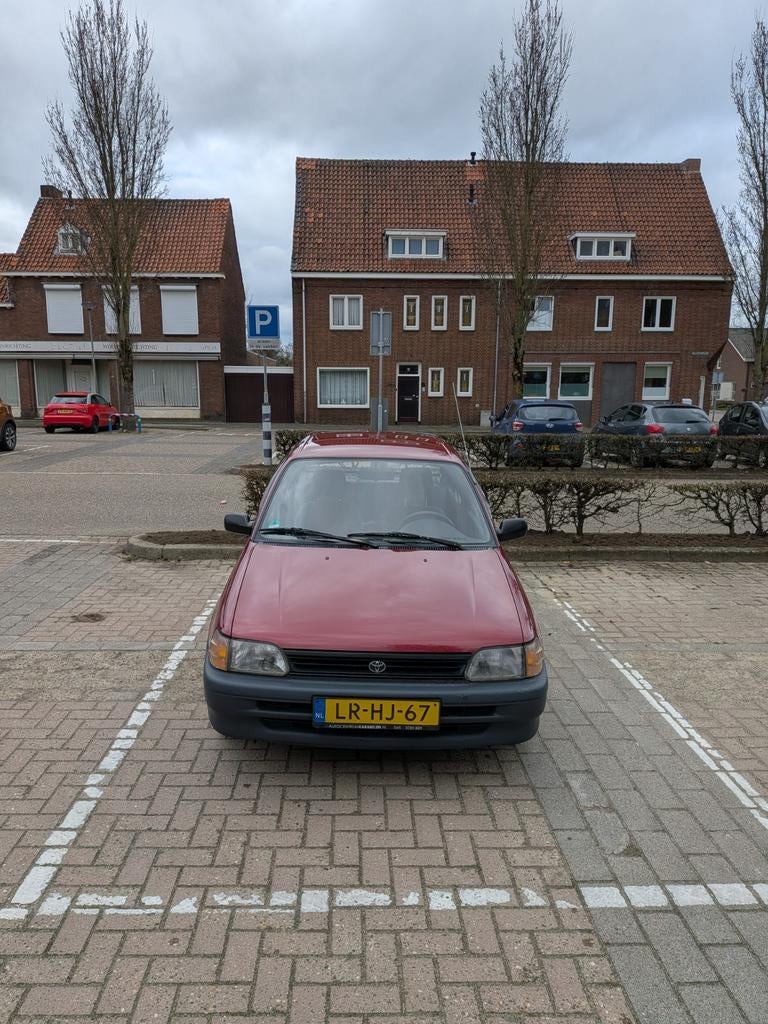 Toyota Starlet 1.3 AUT E2 1995 Rood, Auto's, Toyota, 74 pk, 4 cilinders, Starlet, 400 kg