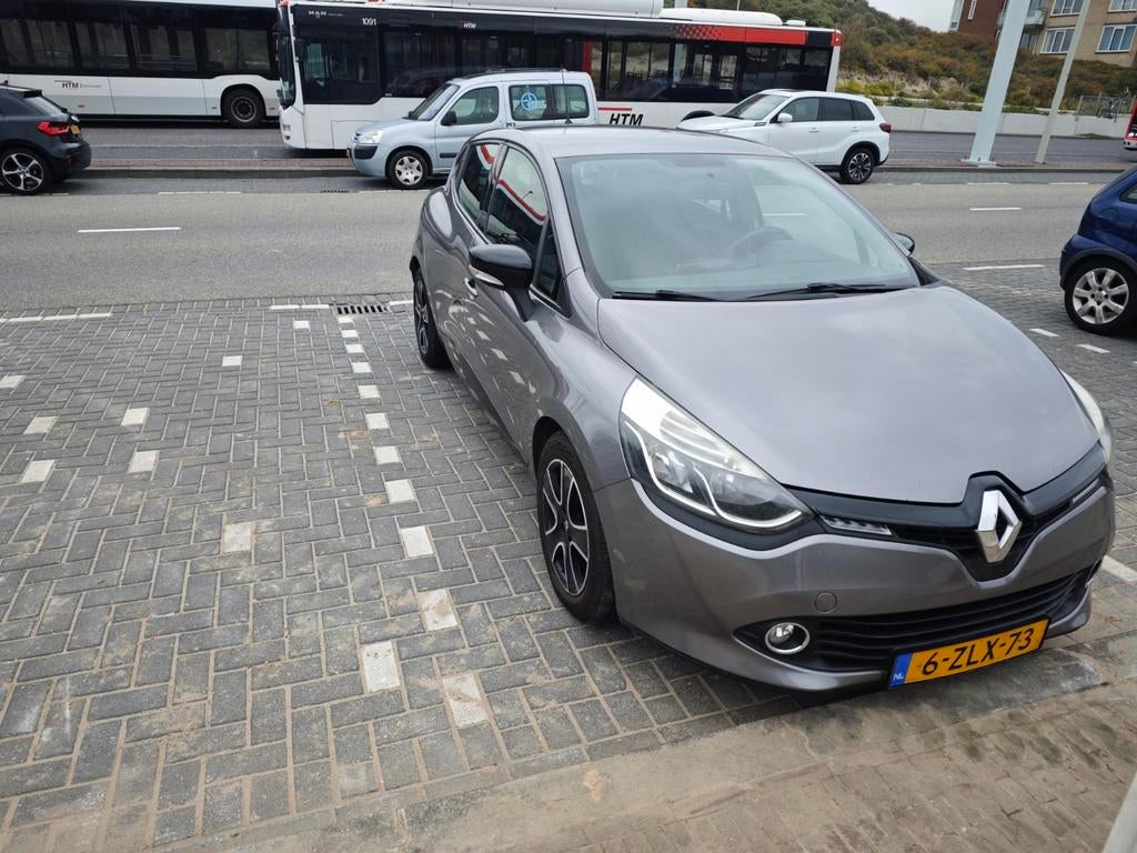Renault Clio 1.5 DCI 66KW 5-DRS 2015 Grijs, Auto's, Renault, Voorwielaandrijving, Stof, Zwart, 4 cilinders