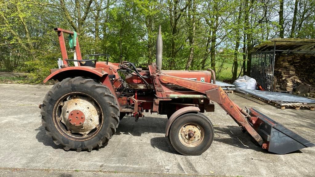 Mc Cormick  International  423 met voorlader en kenteken, Ophalen, Transport