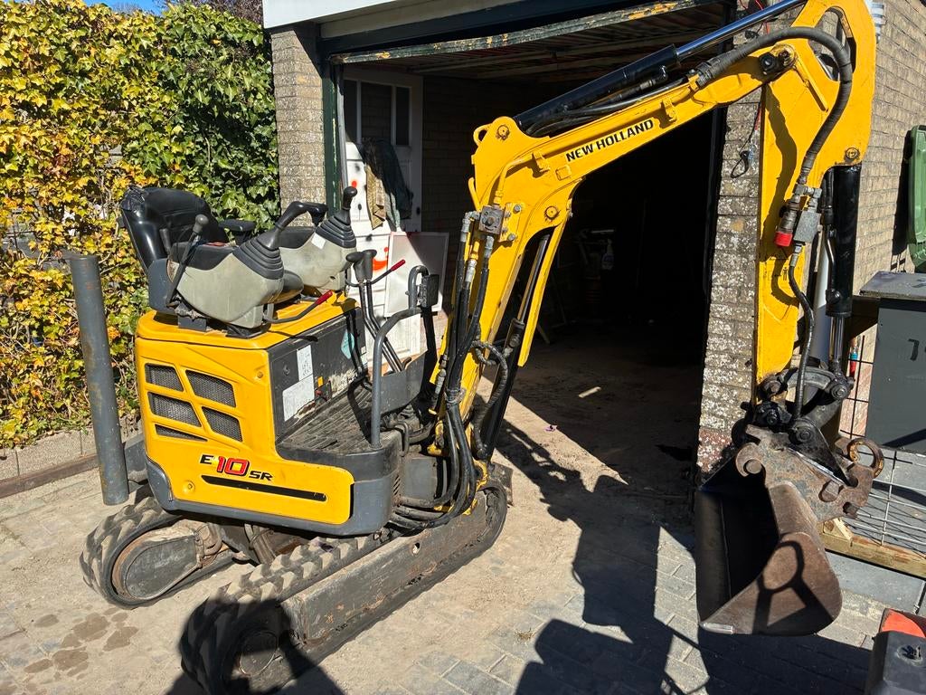 Minigraver New Holland E10SR - marge, Tuin en Terras, Hand-tuingereedschap, Ophalen of Verzenden