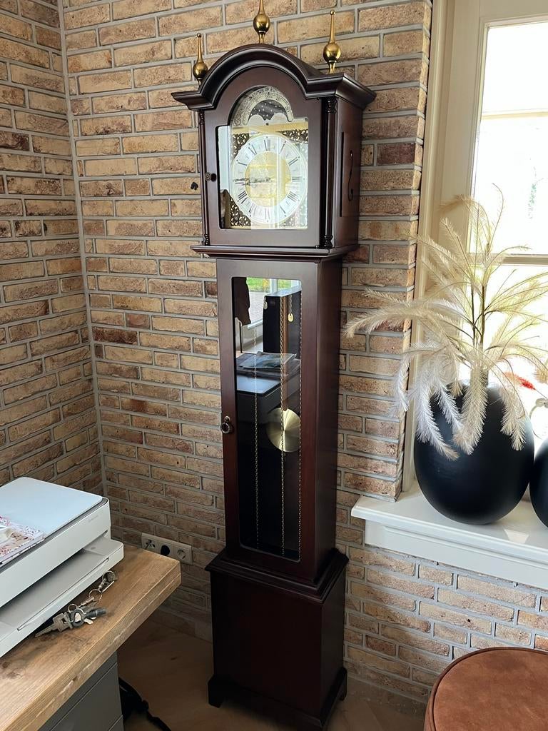 Staande klok met maanstand, Ophalen