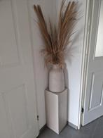 Pilaar met pluimen, Ophalen