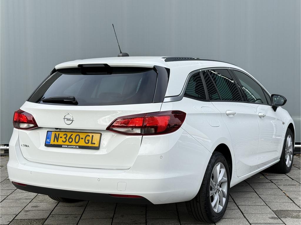 Opel Astra Sports Tourer BWJ 2021 | 1.2T 131PK Bus Elegance, Auto's, 1199 cc, Leder en Stof, Wit, Origineel Nederlands