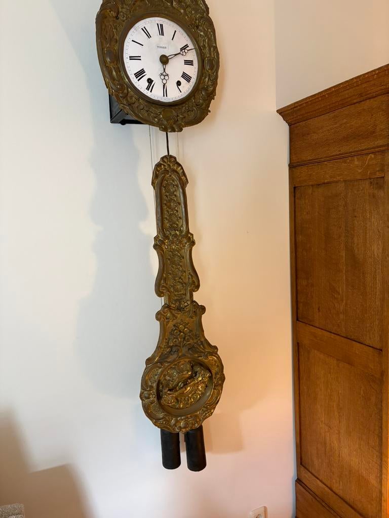 Antieke Comtoise klok, Ophalen