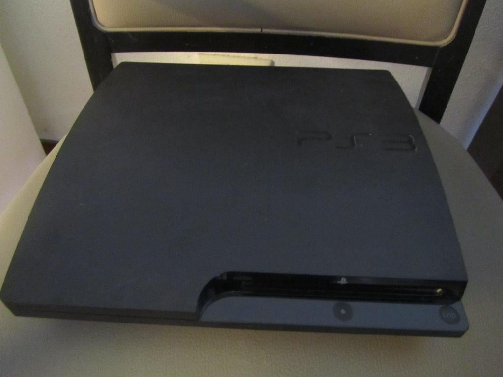 PS3 met games en stuur., Ophalen of Verzenden, Zo goed als nieuw, Met harde schijf, Met 3 controllers of meer