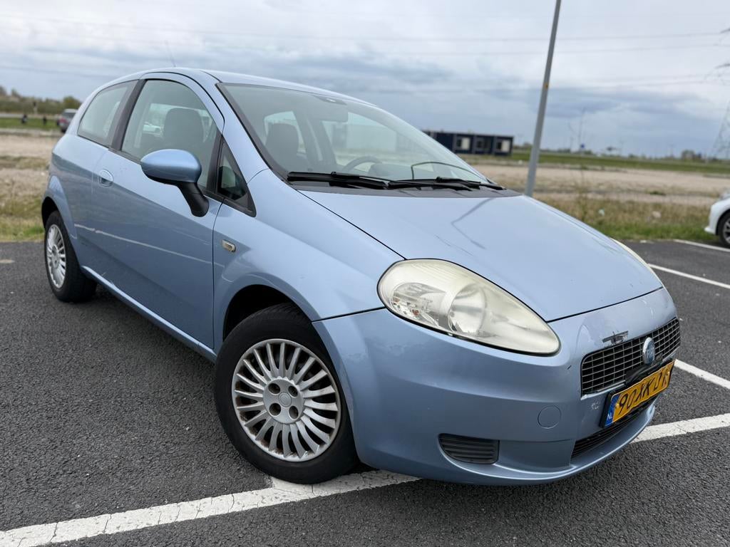 Fiat Grande Punto 1.4 AUTOMAAT/AIRCO/ELEKTR PAKKET/NAP, Auto's, Stof, 40 €/maand, 4 cilinders, Origineel Nederlands