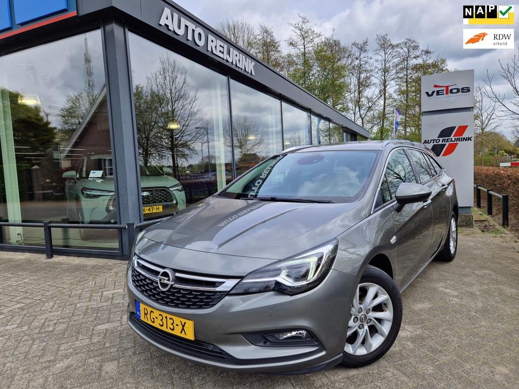 Opel Astra Sports Tourer 1.4 Innovation/TREKHAAK/CAMERA/KEYL, Auto's, Voorwielaandrijving, Stof, Gebruikt, 4 cilinders