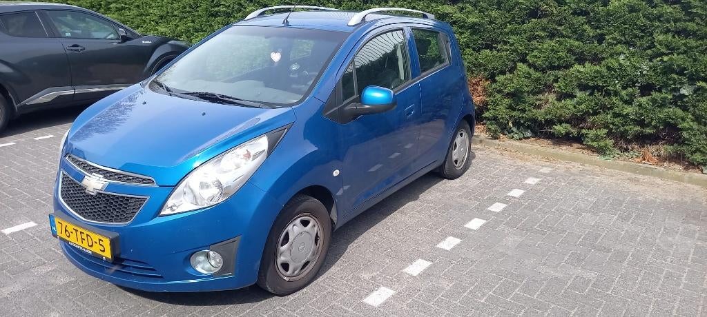 Chevrolet Spark 1.0 Bifuel 2012 Blauw, Auto's, 37 €/maand, 4 cilinders, Blauw, Origineel Nederlands