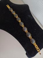 Goudkleurige armband met stenen., Overige materialen, Gebruikt, Ophalen of Verzenden, Met edelsteen