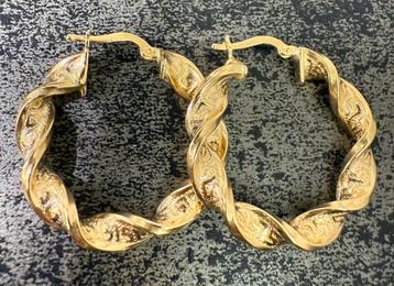 Prachtige 14 karaat gouden wokkel oorbellen met patroon beschikbaar voor biedingen