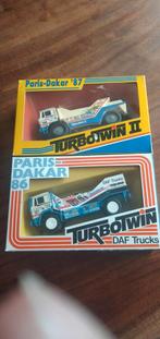 2 Dakars DAF de Rooij schaal 1:50 zie beschrijving, Ophalen of Verzenden, Zo goed als nieuw, Bus of Vrachtwagen, Lion Toys