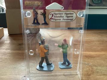 🎄Lemax 2 figuren, reddingswerker redt poesje. beschikbaar voor biedingen