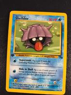 1st edition Jungle Shelder, Hobby en Vrije tijd, Verzamelkaartspellen | Pokémon, Ophalen of Verzenden, Zo goed als nieuw