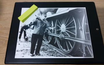 Foto van een oude stoomtrein beschikbaar voor biedingen