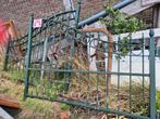 Gietijzeren poort te koop., Tuin en Terras, Ophalen, Gebruikt, IJzer, Sierhekwerk