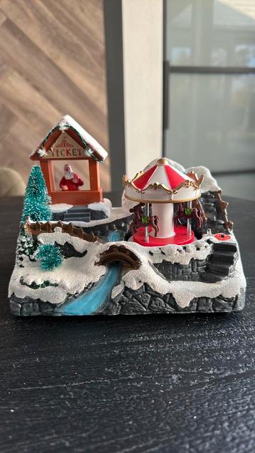 Kerstdorp draaimolen beschikbaar voor biedingen