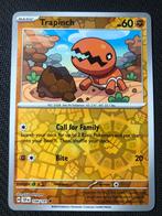 Trapinch Reverse Holo 104/191 Surging Sparks - Packfresh, Hobby en Vrije tijd, Verzamelkaartspellen | Pokémon, Verzenden, Zo goed als nieuw