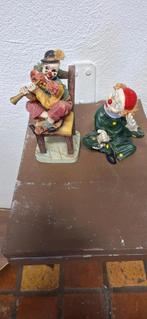 Twee vrolijke clown beeldjes, Ophalen