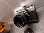 Minolta srt101 met Sigma 28mm f2.8 mini wide II, Ophalen of Verzenden, Zo goed als nieuw, Compact