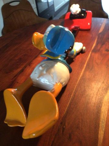 : Donald Duck met Grasmachine, wordt mee gesleurt 1.1m lang beschikbaar voor biedingen