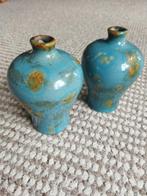 Twee blauwe vaasjes, Ophalen
