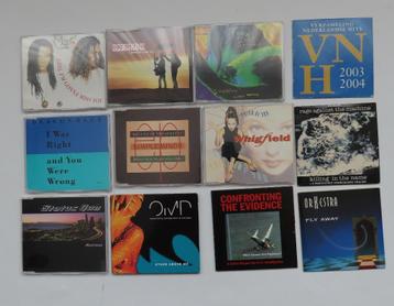 Verzameling van (jaren 90) 18 CD singles en 4 CD albums beschikbaar voor biedingen