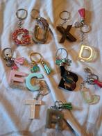 PARTIJ sleutelhangers epoxy 3,50 euro (E), Ophalen of Verzenden, Nieuw, Zilver, Overige materialen