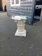 Zuil met glasplaat (bezet tafelje), Ophalen