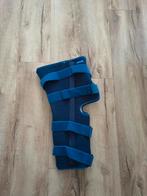 Blauwe kniebrace van Actimove, mt L. Been brace verstelbaar, Actimove, Onbekend, Ophalen of Verzenden, Zo goed als nieuw