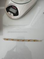 14 karaat gevlochten stukjes (mattenklopper) armband., Verzenden, Nieuw, Goud