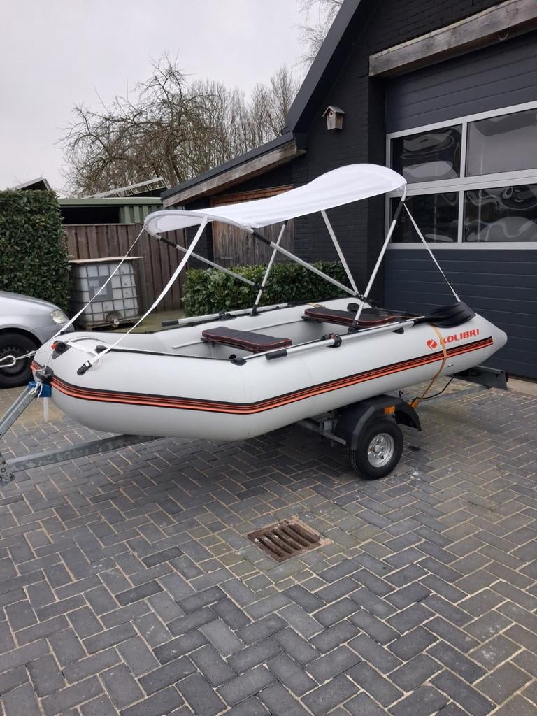 Rubberboot met trailer., Watersport en Boten, Rubberboten, Overige brandstoffen, Zo goed als nieuw, Hout, Minder dan 70 pk