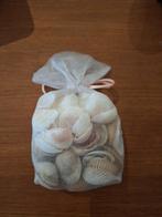 Gratis zakje met schelpen, Ophalen