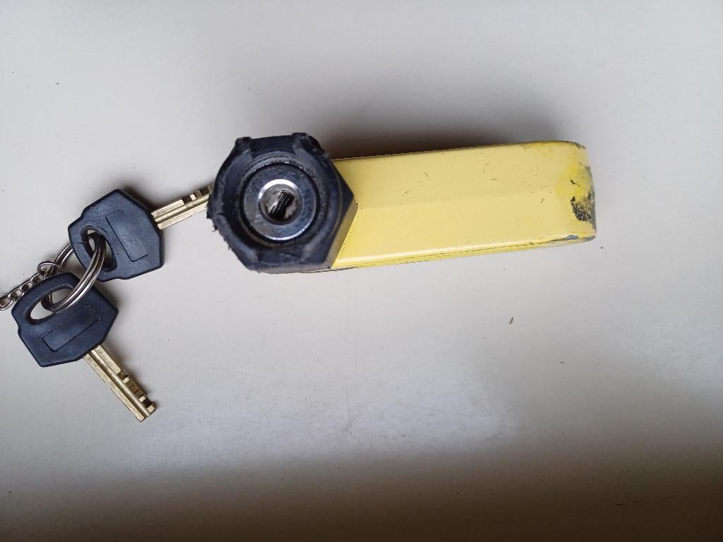 Schijfremslot, Ophalen